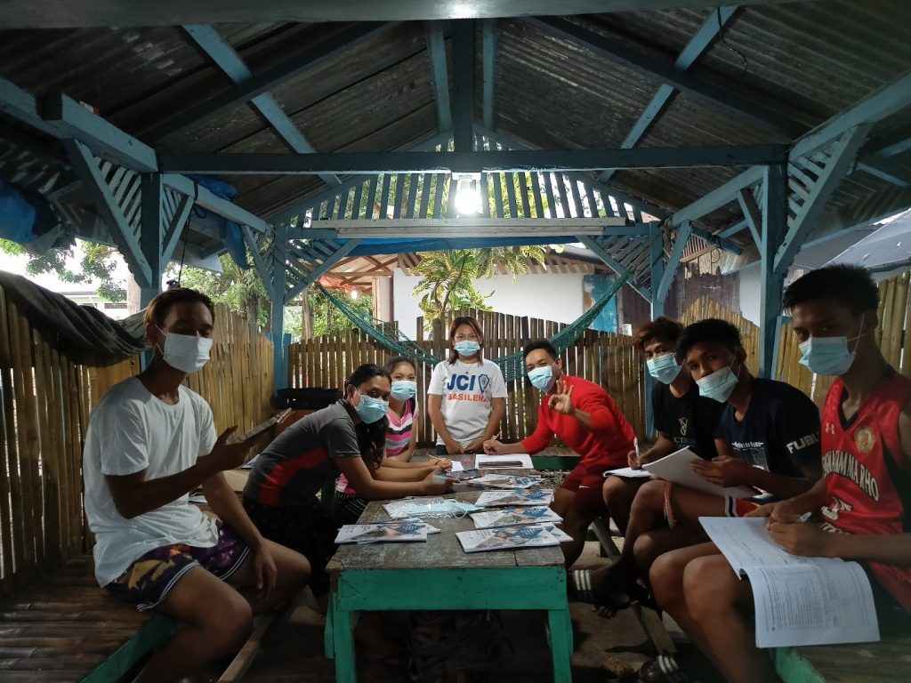 Youth around a table